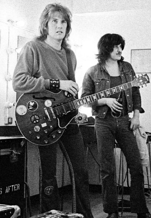 Alvin Lee Holding Big Red After it went to Guitar Hospital